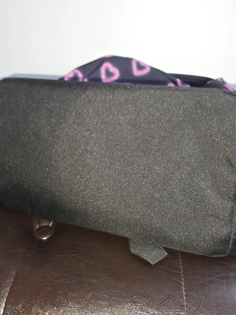 Jansport Black Backpack with Neon Pink Heart Pattern